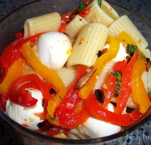 Roasted Pepper Pasta Salad served in a glass bowl