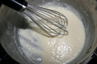 Wishing milk into flour mixture