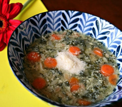 Italian Egg Drop Soup soup served in a blue and white bowl