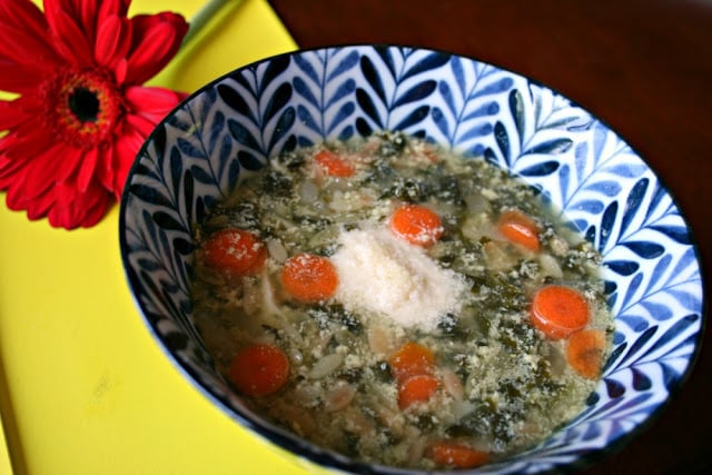 Italian Egg Drop Soup soup served in a blue and white bowl