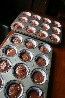 2 muffin pans filled with soda cupcake batter