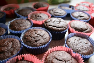 chocolate soda cupcake cooling on table