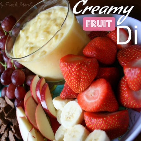 Creamy Fruit Dip served with fresh fruit on a serving platter