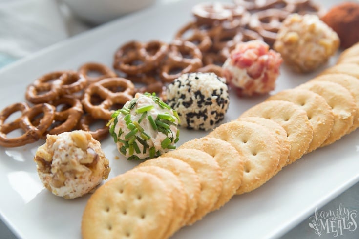 Mini Cheese Balls - mini cheese balls served on a plate with crackers and pretzels