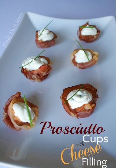 Prosciutto Cups with Cheese & Herb Filling served on a white plate