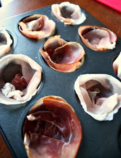 Prosciutto laid in mini muffin tin pans 