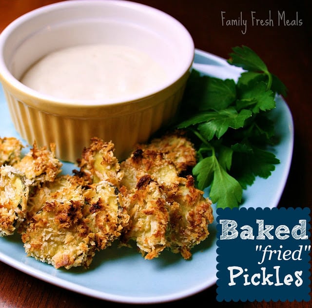 Baked Fried Pickles served on a blue plate with dipping sauce