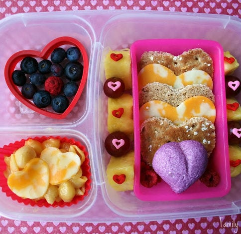 Top down picture of lunch box filled with heart shaped food