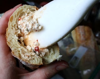 Stuffed Baguette Recipe - placing creamy mixture inside baguette