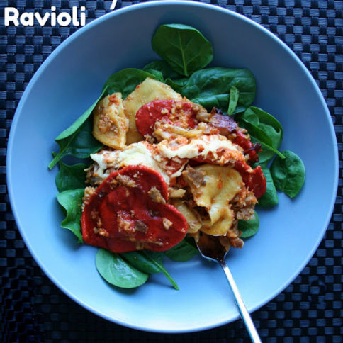 Crockpot Ravioli served in a blue bowl