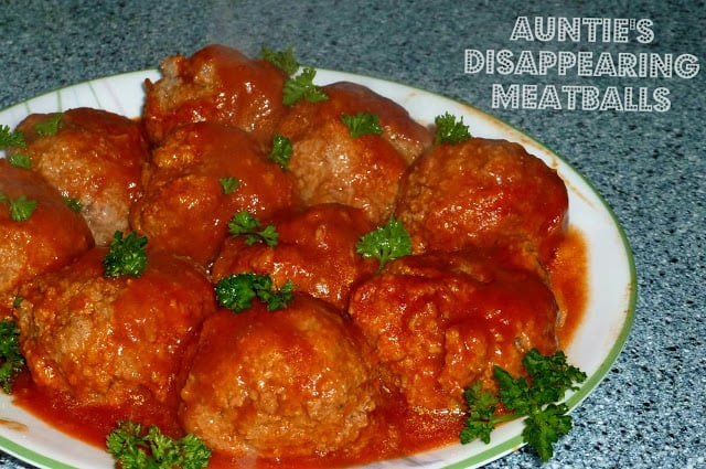 Large meatballs on a white plate