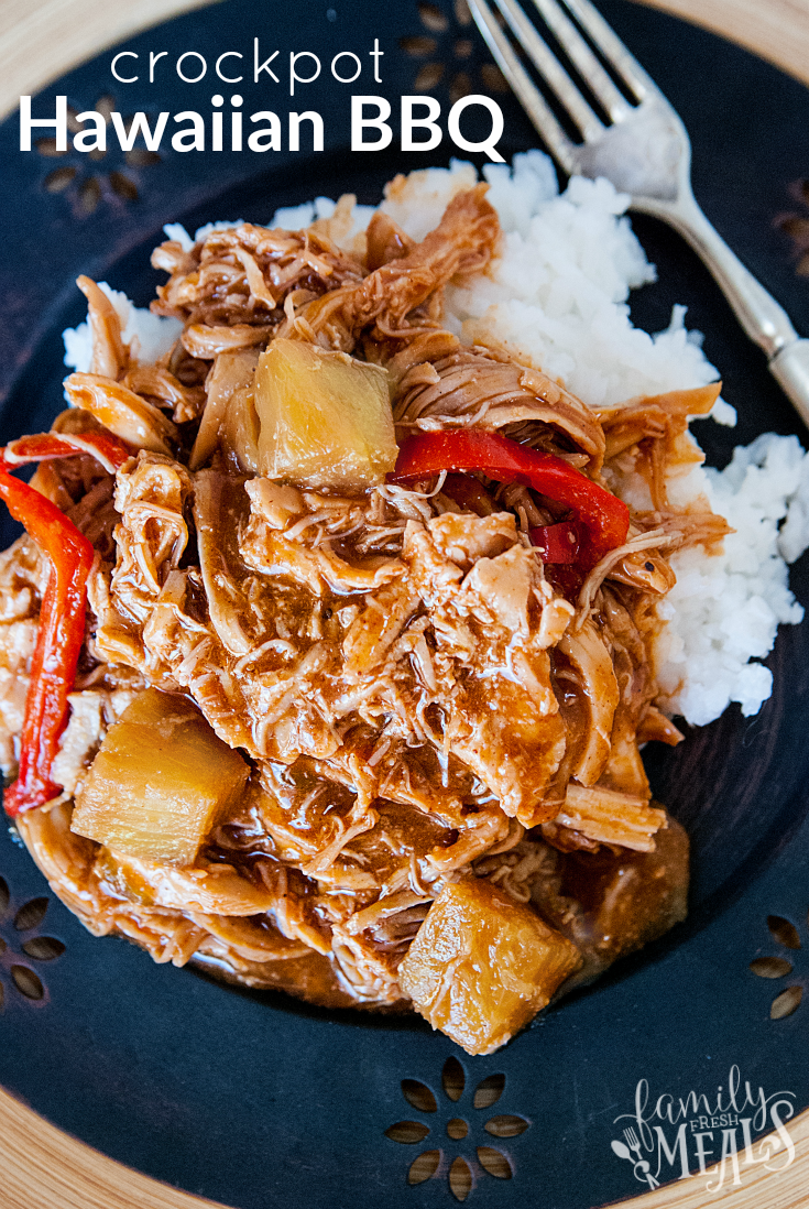 Hawaiian BBQ Bell Pepper Crockpot Chicken served over rice on a blue plate