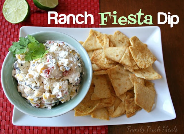 Ranch Fiesta Dip served in a bowl with a side of pita chips