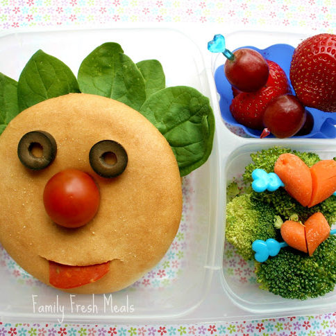 Top down image of a funny face themed lunchbox