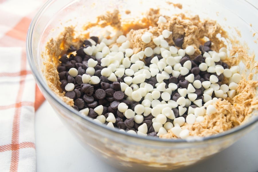 chocolate chips and white chocolate chips to mixing bowl