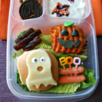 Top down image of halloween themed food in an Easy Lunchbox container