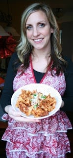 woman holding bowl of healthy hamburger helper