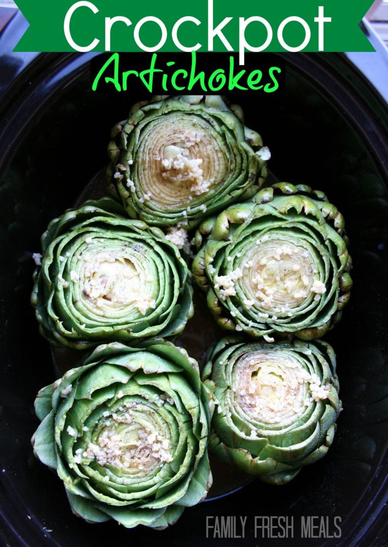 top down image of artichokes in a slow cooker