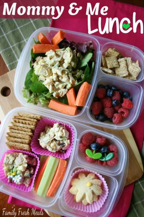 Top down image of 2 lunchboxes with curry chicken salad