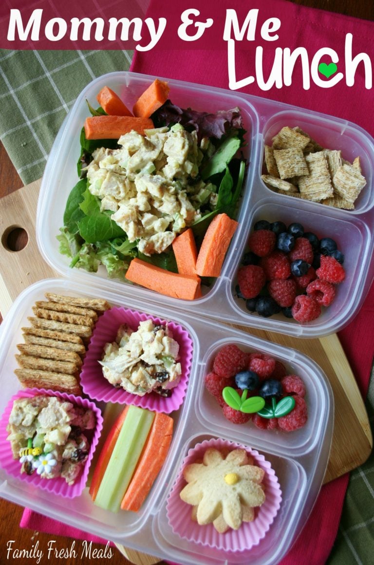 Top down image of 2 lunchboxes with curry chicken salad