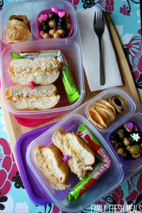 Bean and olive salad packed in a lunchbox with sandwich