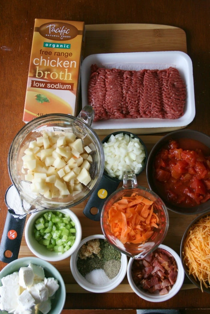 Crockpot Bacon Cheeseburger Soup ingredients laid out on a table
