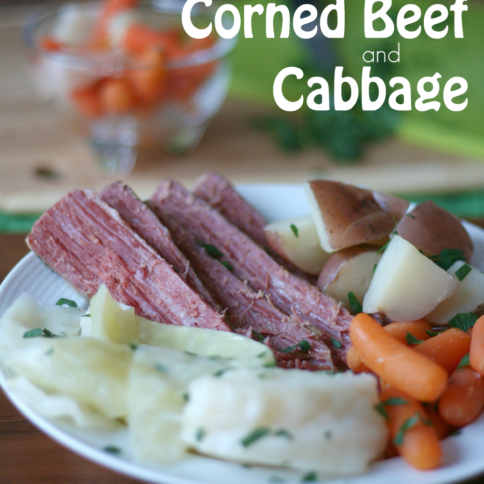 Crockpot Corned Beef and Cabbage served on a white plate