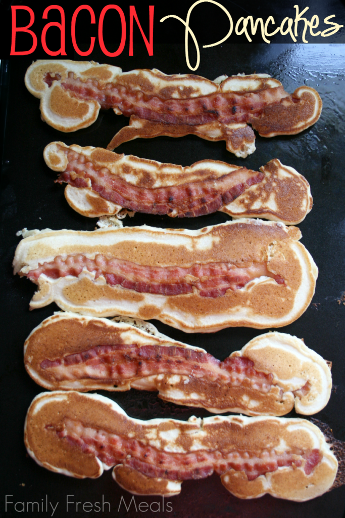 cooked bacon pancakes on cooking griddle