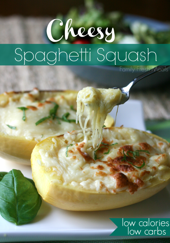 Cheesy Spaghetti Squash served on a while plate with a fork lifting up a bite of squash