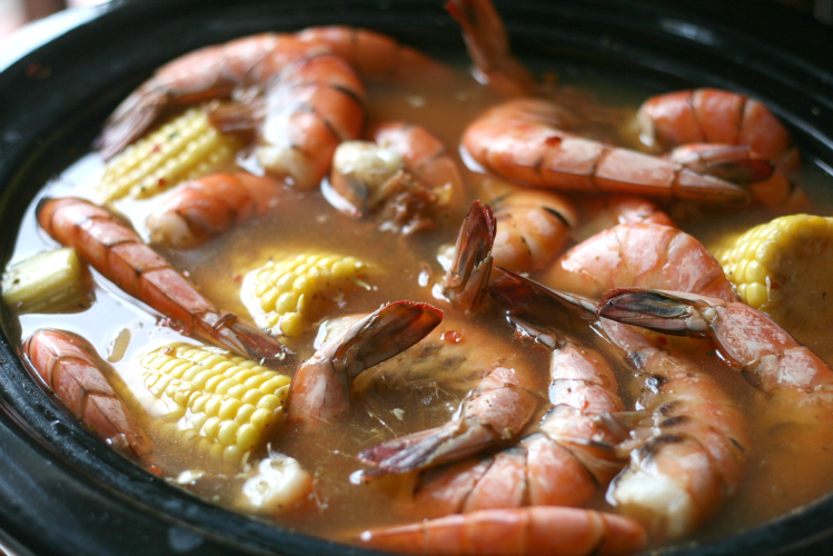 Crockpot Low Country Boil - Corn and shrimp added to the slow cooker 