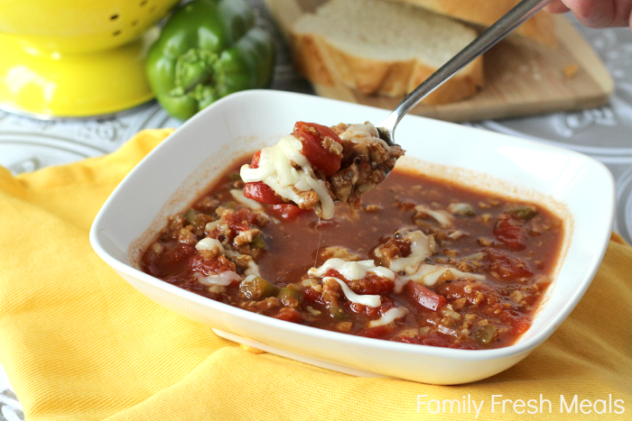 Spoon scooping up a scoop of stuffed pepper soup