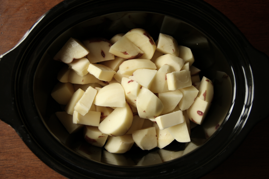 cut up potatoes in a slow cooker