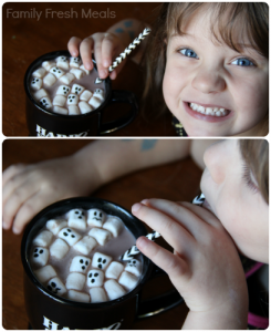 child drinking halloween hot cocoa