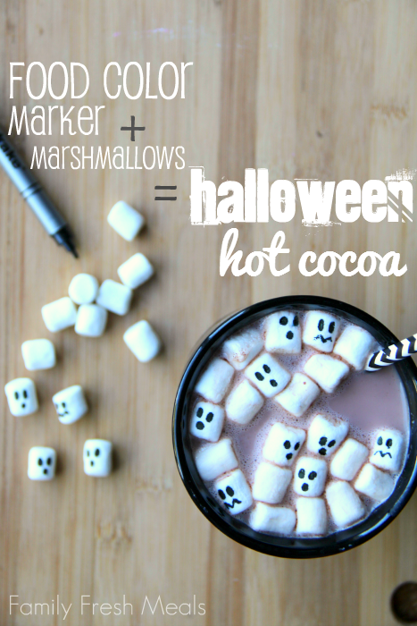 hot cocoa with marshmallows that have ghost faces on them