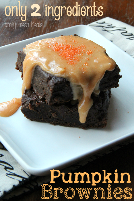 Two Pumpkin Brownies stacked on a white plate