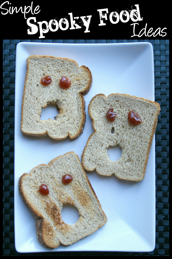 3 slices of toast made to look like ghosts, with jelly eyes