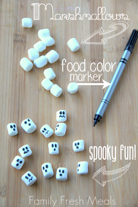 marshmallows on a cutting board with a food marker