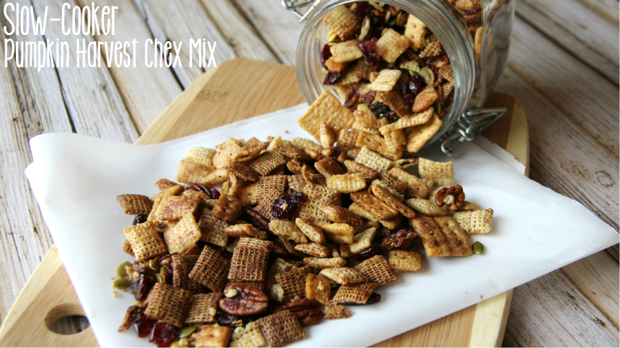 Slow Cooker Pumpkin Harvest Chex Mix pouring out of a glass jar