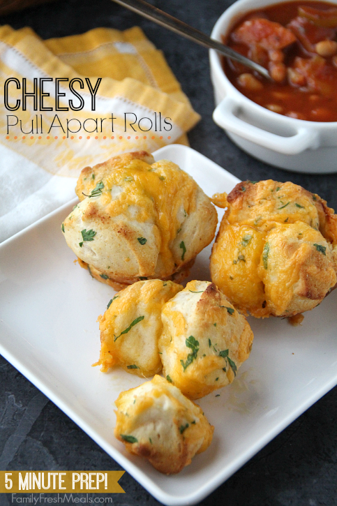 Three Cheesy Pull Apart Rolls on a white plate