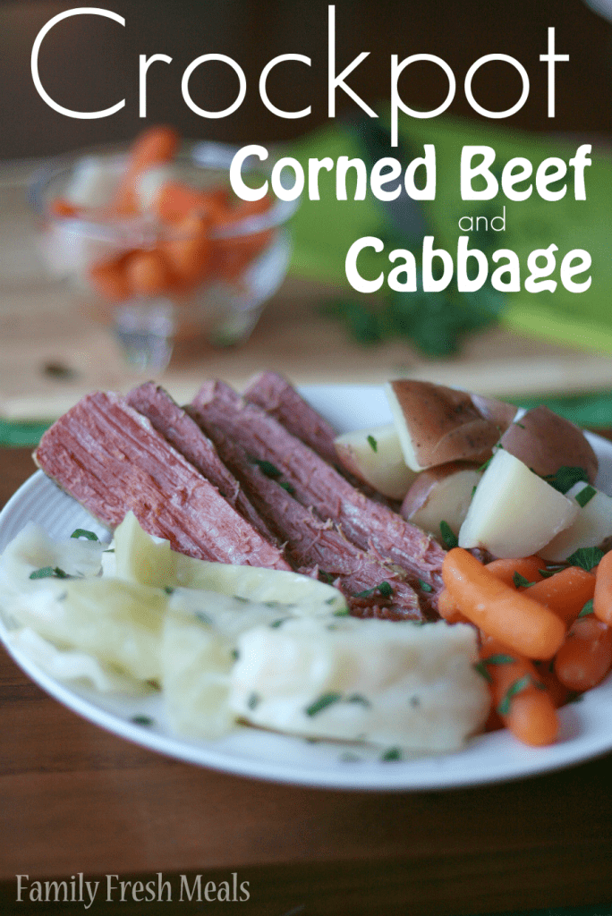 Crockpot Corned Beef and Cabbage served on a white plate