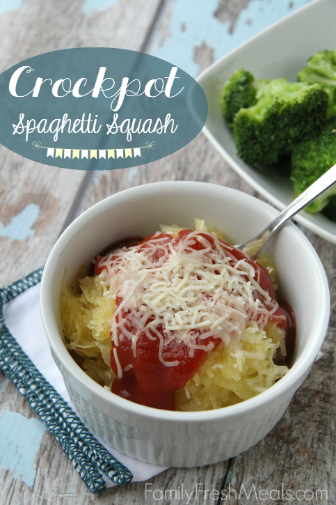 Spaghetti Squash in a small bowl topped with sauce and cheese