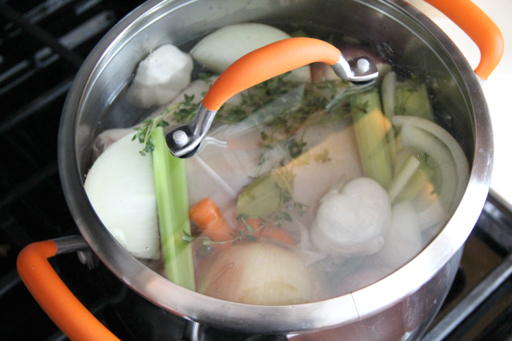 Chicken Broth ingredients in a large pot, with lid on