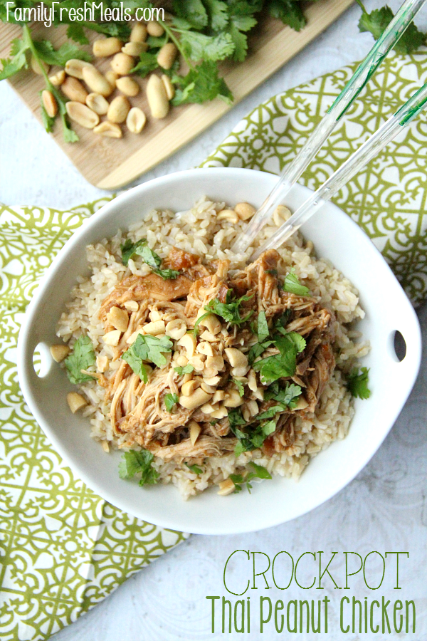  Top down image of crockpot Thai Peanut Chicken served in a white bowl with chop sticks