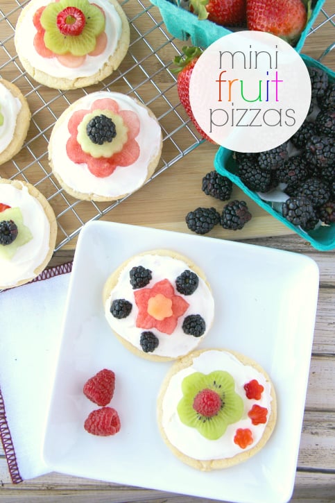 Mini Fruit Pizza on a white plate, paired with fresh fruit