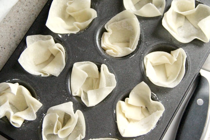 Wonton wrappers in mini muffin tin