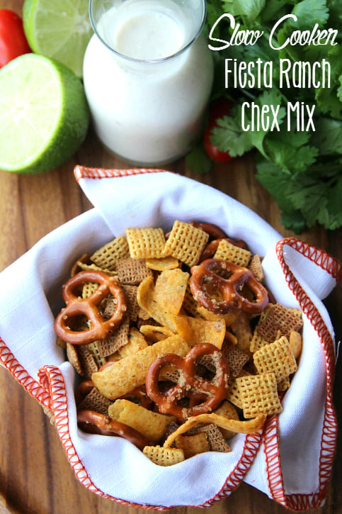 Crockpot Fiesta Ranch Chex Mix served in a bowl lined with a napkin