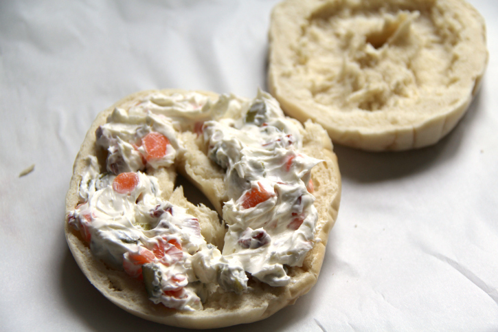 cream cheese spread onto one half of bagel