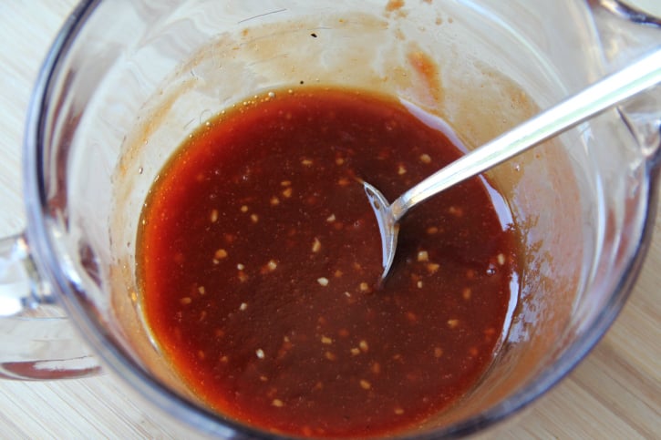 Crockpot Polish Sausage - Honey garlic sauce mixed in a bowl