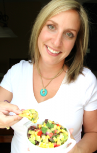 Woman holding a bowl of Cowboy Caviar