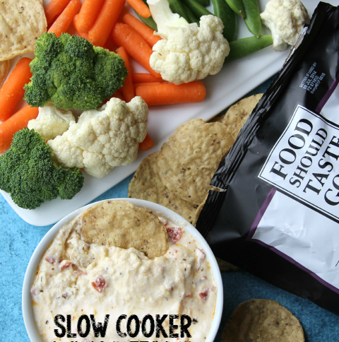 Slow Cooker Cheesy White Pizza Dip - FamilyFreshMeals.com - This easy, cheesy Slow Cooker White Pizza Dip is so incredibly simple to make. You literally throw everything into the slow cooker and go. A few hours later, you have an appetizer ready and waiting. Talk about easy entertaining!